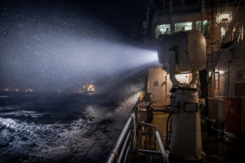 marine searchlight operating under harsh offshore salt spray and vibration conditions